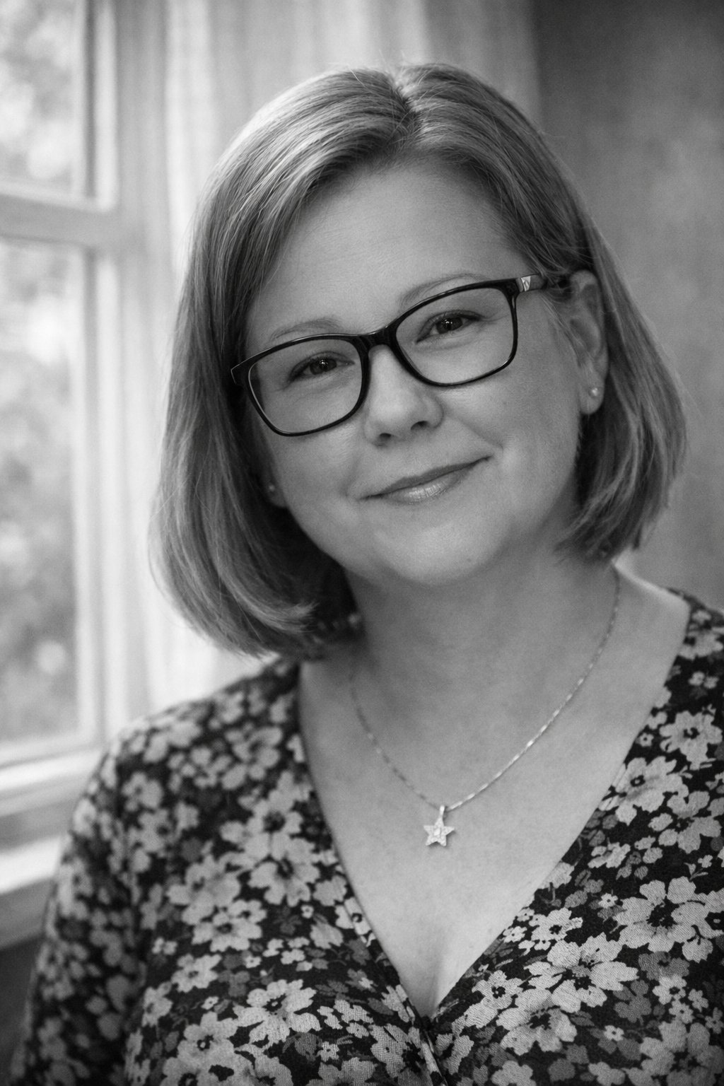Sarah-Jayne, founder of Time to Talk Hub, in a warm, homely setting with soft natural light